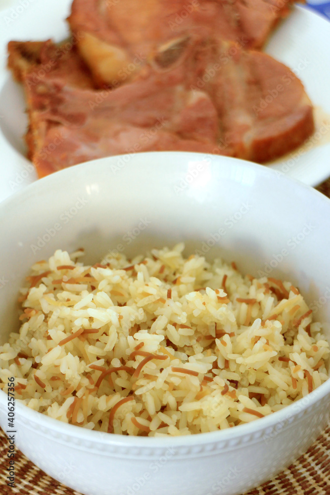 Rice with noodles and fried pork chop. Rice with noodles and fried pork chop.