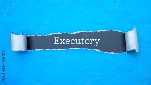 Executory. Blue torn paper banner with text label. Word in gray hole.