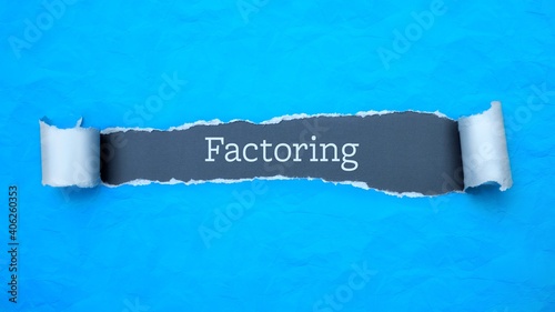 Factoring. Blue torn paper banner with text label. Word in gray hole.
