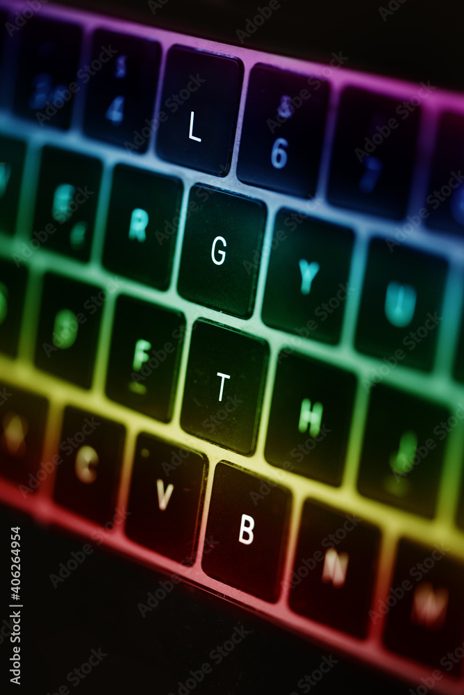 LGTB Concept Close up of a laptop keyboard with a rainbow on it