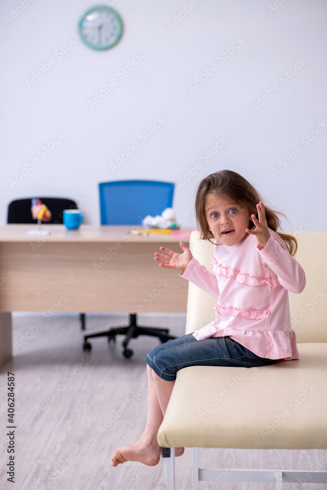 Small girl waiting for doctor in the clinic Small girl waiting for doctor in the clinic