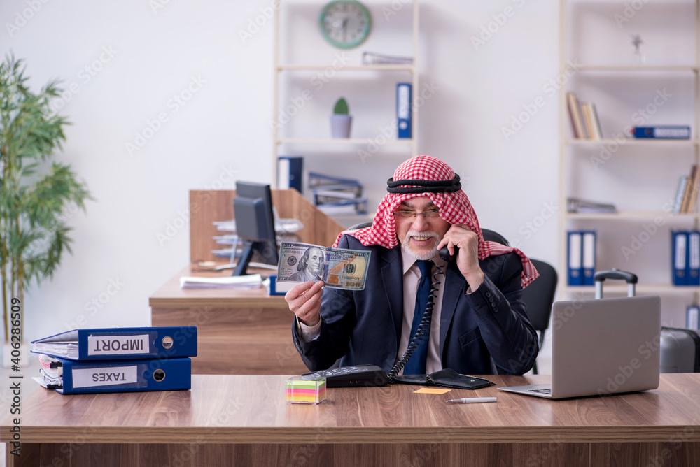 Old arab businessman in the office Old arab businessman in the office