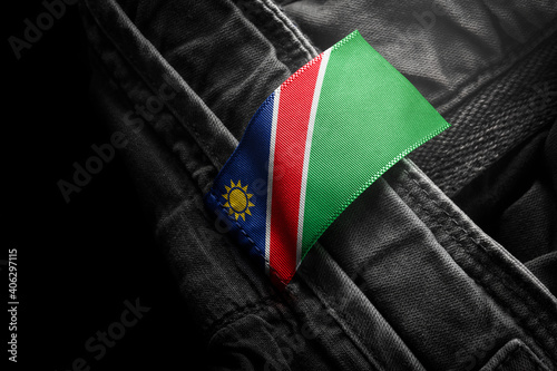 Tag on dark clothing in the form of the flag of the Namibia