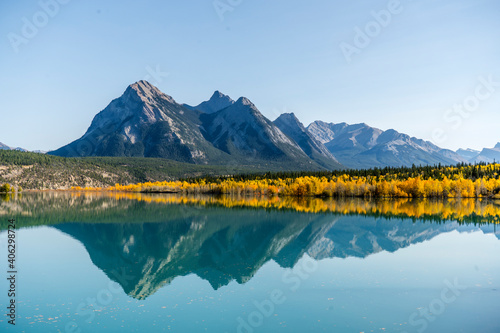 Mountains in autumn and water reflection © Martin