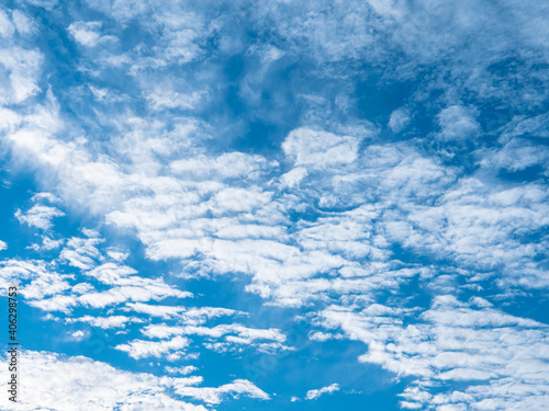 White clouds cumulus floating on blue sky for backgrounds concept. © phuangphech