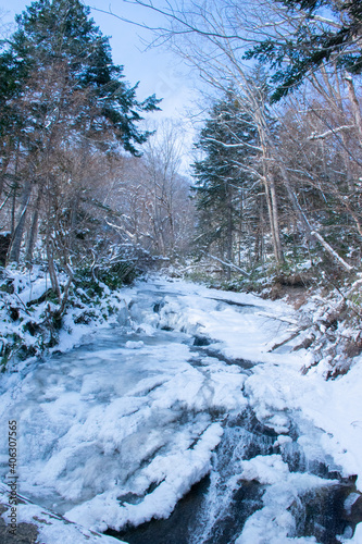 Frozen waterfall covered with snow (Rarumanai waterfall in Eniwa, Hokkaido)