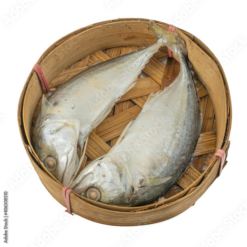 Steamed mackerel (Rastrelliger brachysoma) Container in circular bamboo trays isolated on white background photo