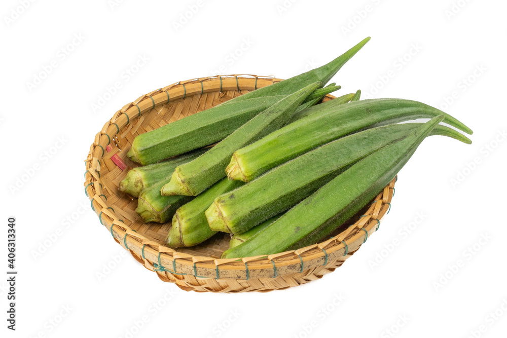 Raw Green Organic okra, Lady's fingers, Gombo, Gumbo, Bendee, Quimbamto (Abelmoschus esculentus) isolated on white background Raw Green Organic okra, Lady's fingers, Gombo, Gumbo, Bendee, Quimbamto (Abelmoschus esculentus) isolated on white background