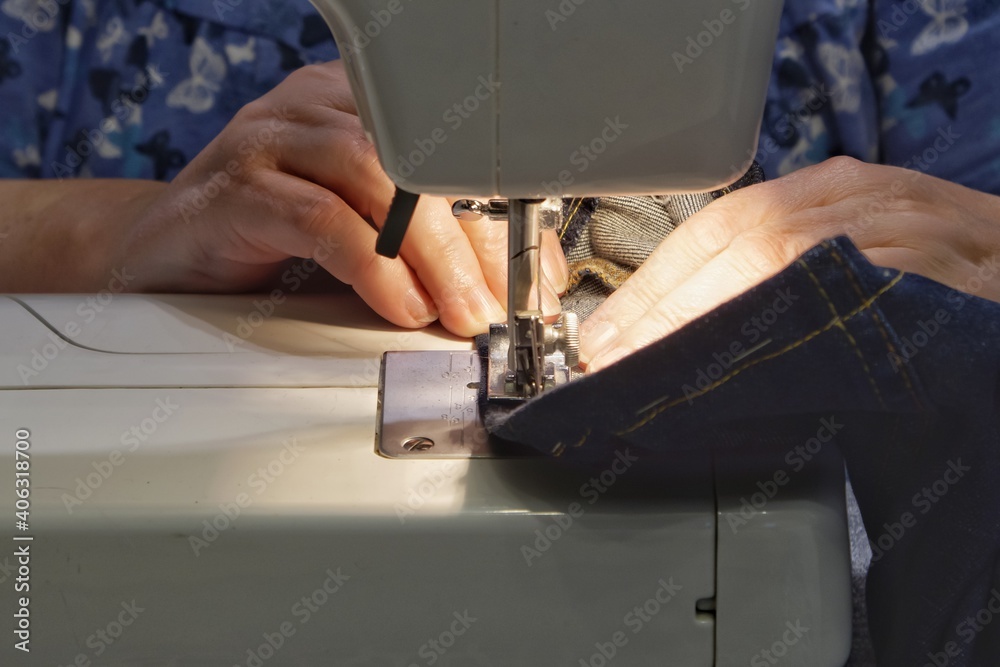 woman sewing on a home sewing machine