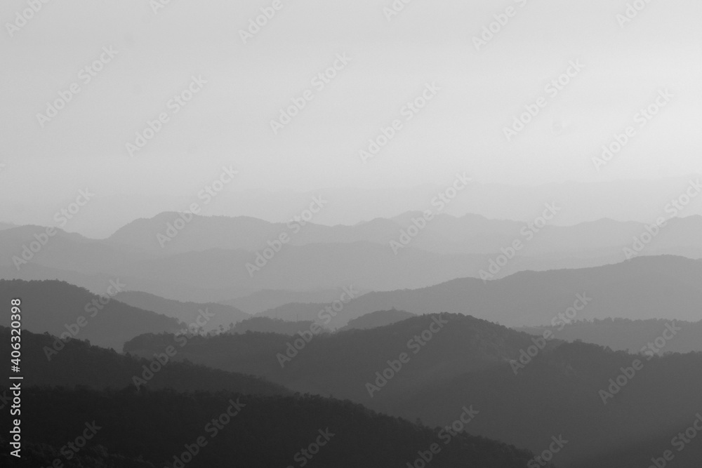 Foggy layered mountain landscape in maehongson province, thailand.