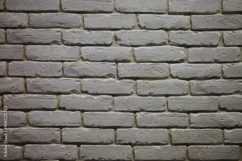 White industrial brick background. Wall of building material close-up. Copy space for site or banner