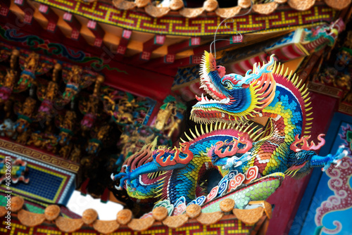 Traditional Chinese Ceramic dragon sculpture on temple roof