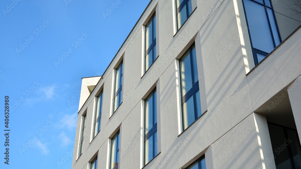 Fragment of modern luxury residential apartment, home house building concept. Modern apartment building on a sunny day with a blue sky. Fragment of modern luxury residential apartment, home house building concept. Modern apartment building on a sunny day with a blue sky.