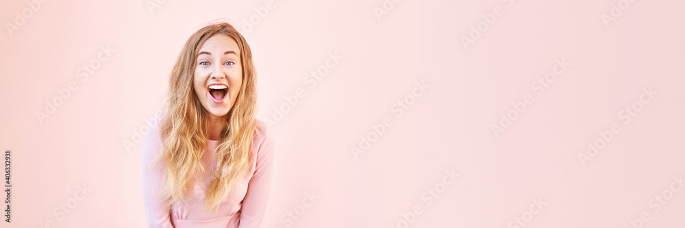 Pretty young woman amazed by sale news. Happy female person outdoors. Summer cute portrait. Lady blonde long hair. Cute adult student at town. Pink background. Copyspace. Wow female emotion Pretty young woman amazed by sale news. Happy female person outdoors. Summer cute portrait. Lady blonde long hair. Cute adult student at town. Pink background. Copyspace. Wow female emotion