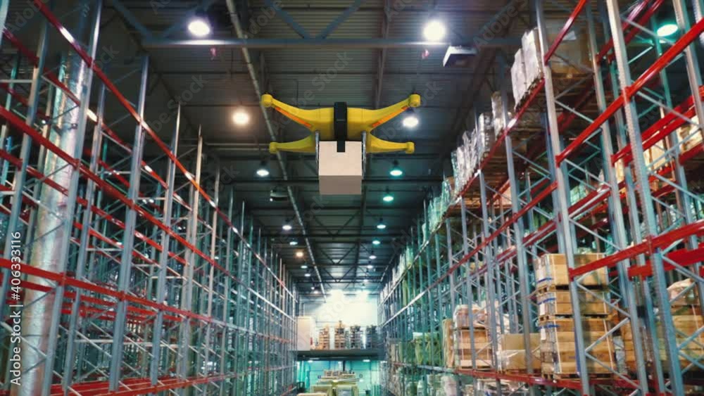 Drone with a package on a board flying inside warehouse. Delivery future concept.