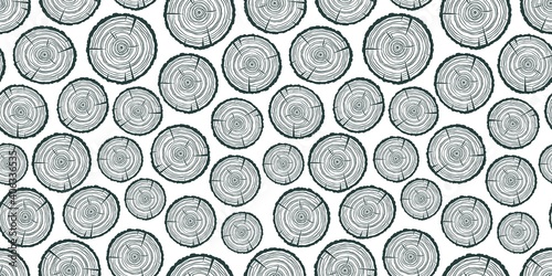 Seamless pattern wallpaper with slice of wood. Wooden log with rings