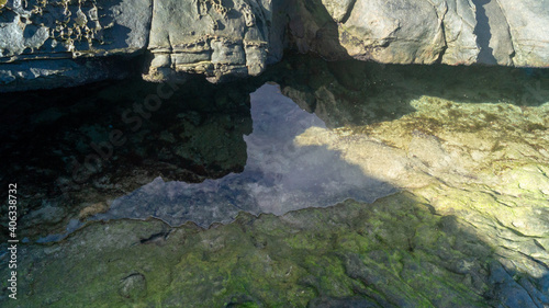  image water under rocks HD in the sea