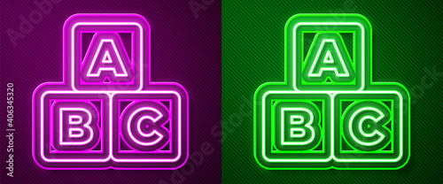 Glowing neon line ABC blocks icon isolated on purple and green background. Alphabet cubes with letters A,B,C. Vector.