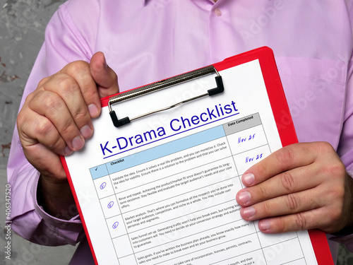 Business concept about K-Drama Checklist with sign on the page. photo