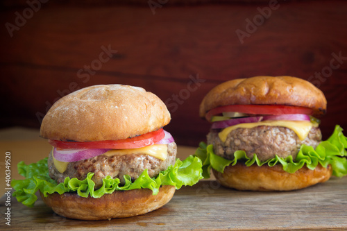 Homemade burger with meat patty and vegetables