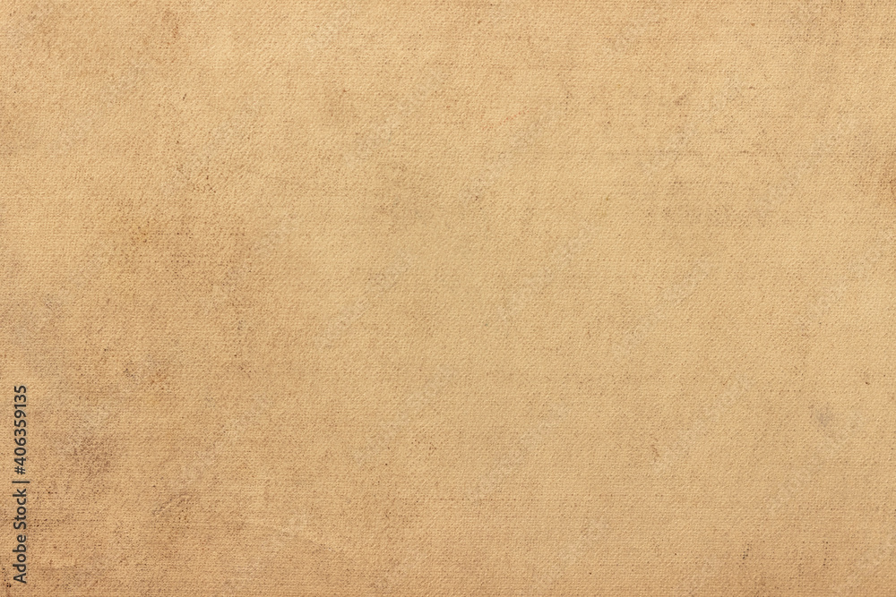 The surface of the old worn faded cardboard is stained. The surface of the old worn faded cardboard is stained.