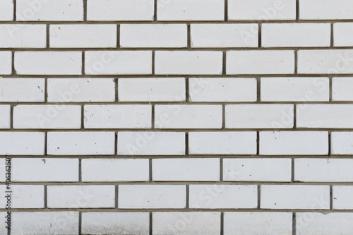 Brick wall made of white silicate brick with mortar spots