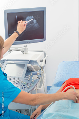 medical ultrasound scanner close-up. Doctor makes ultrasound diagnosis photo