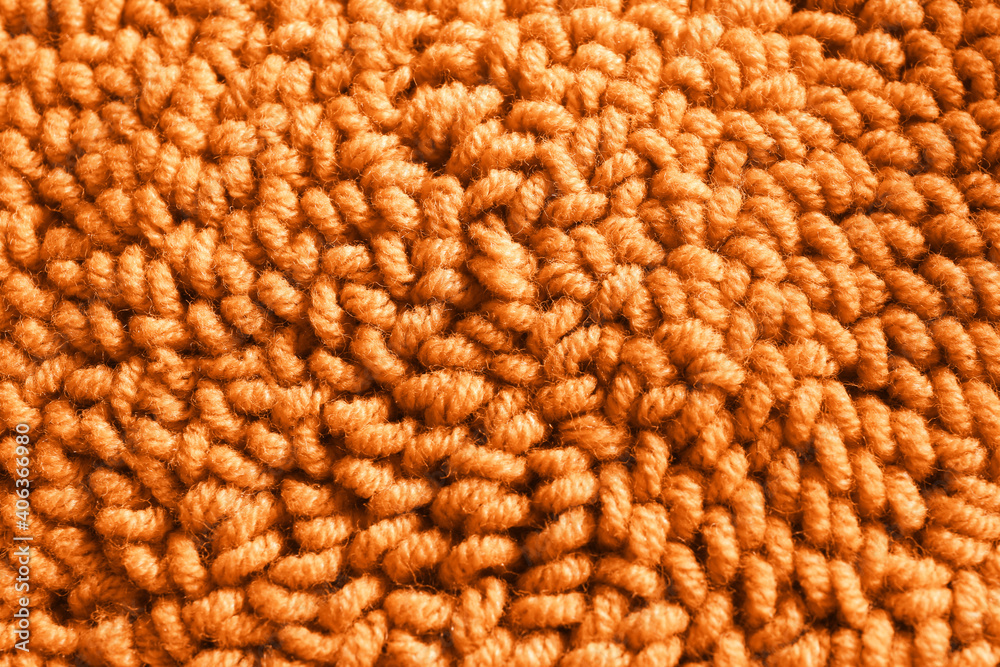 Orange woolen threads as background, top view Orange woolen threads as background, top view