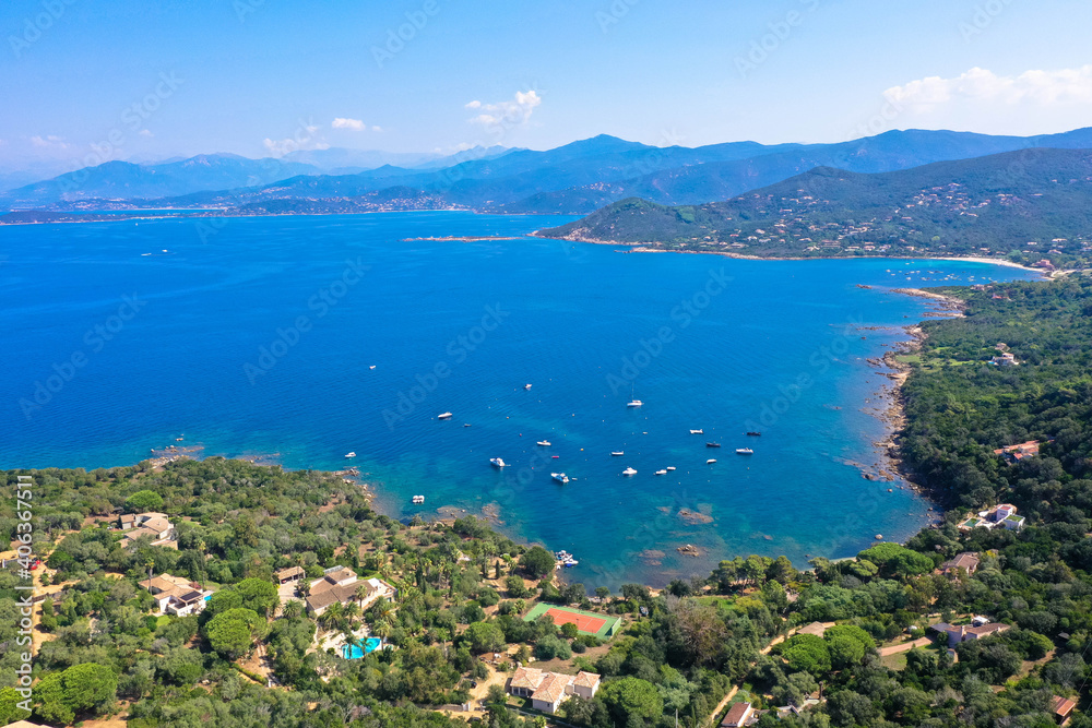 Panoramic aerial view of the corsican coast with a mountain village near the capital Ajaccio. Corsica, France.