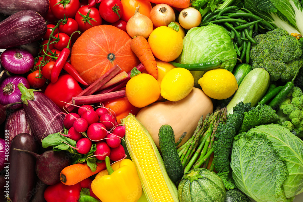 Many fresh vegetables as background, top view