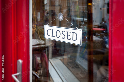 an closed sign at the shop door