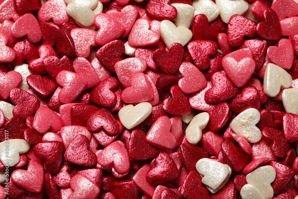 Sweet candy hearts as background, top view Sweet candy hearts as background, top view