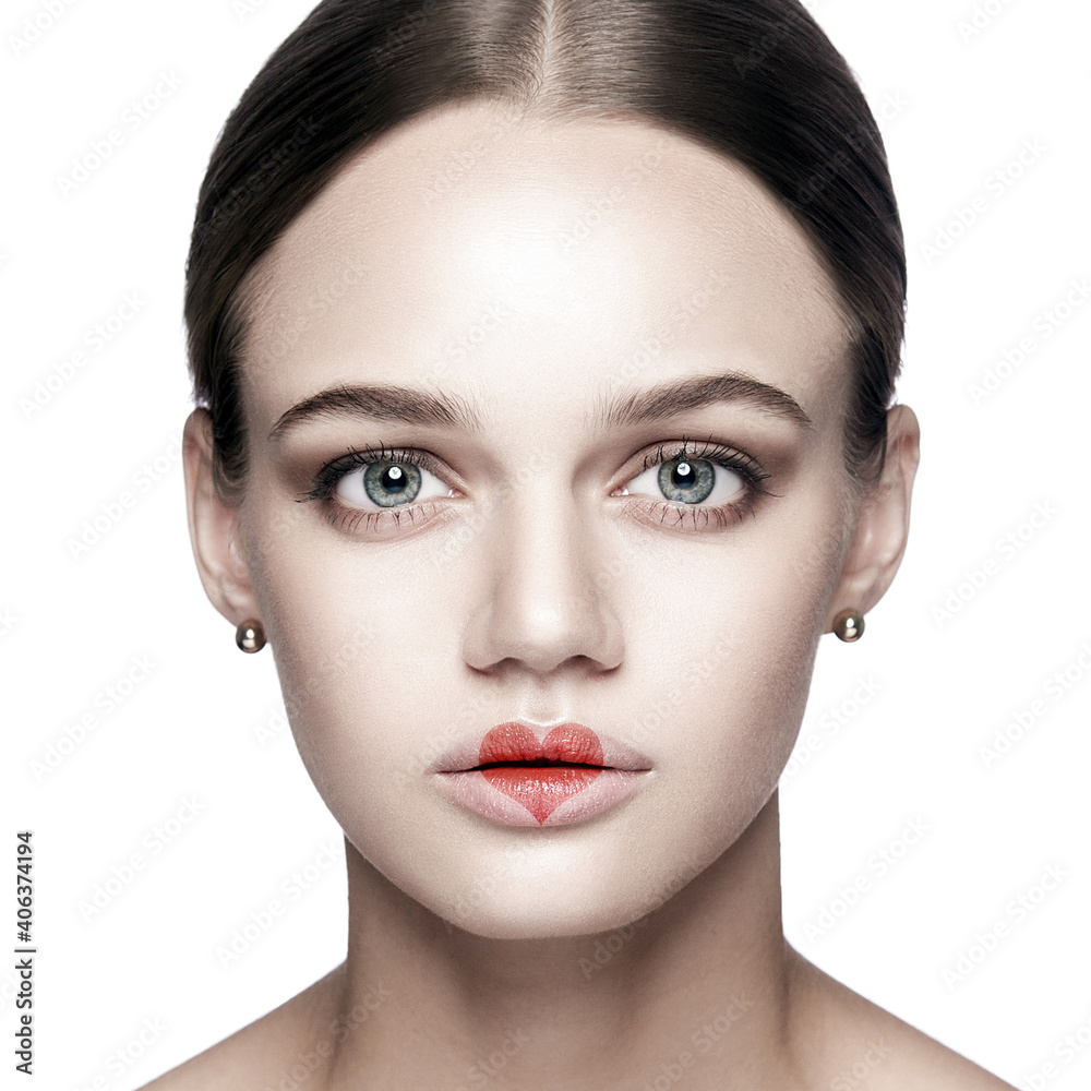 Portrait of beautiful woman with makeup and red heart shape on her lips. valentines day and beauty love and care concept. indoor studio shot, Isolated on white background. Portrait of beautiful woman with makeup and red heart shape on her lips. valentines day and beauty love and care concept. indoor studio shot, Isolated on white background.