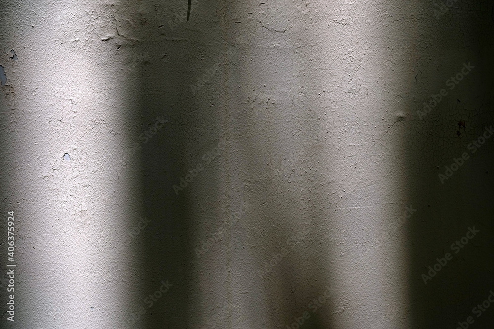 Obraz premium Light Beam and Shadow on Grunge Concrete Wall.