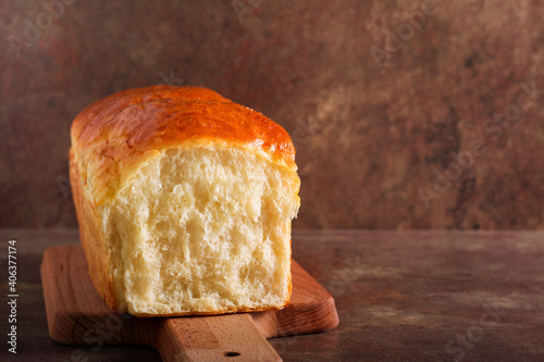Homemade soft, fluffy white bread loaf photo