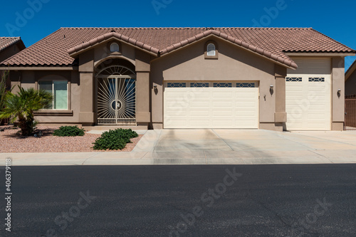 The facade of a residential house in a suburb area in the State of Nevada, USA.