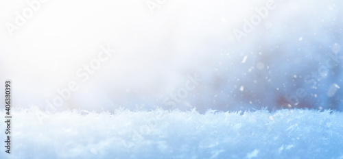 Winter holidays abstract background with beautiful bokeh lights and snowflakes with copy space ideal for your project or banner.