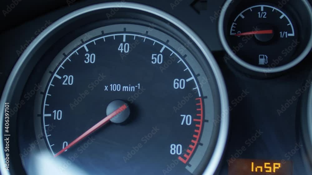 Turning off the ignition of the car. Close-up modern dashboard of the car Turning off the ignition of the car. Close-up modern dashboard of the car