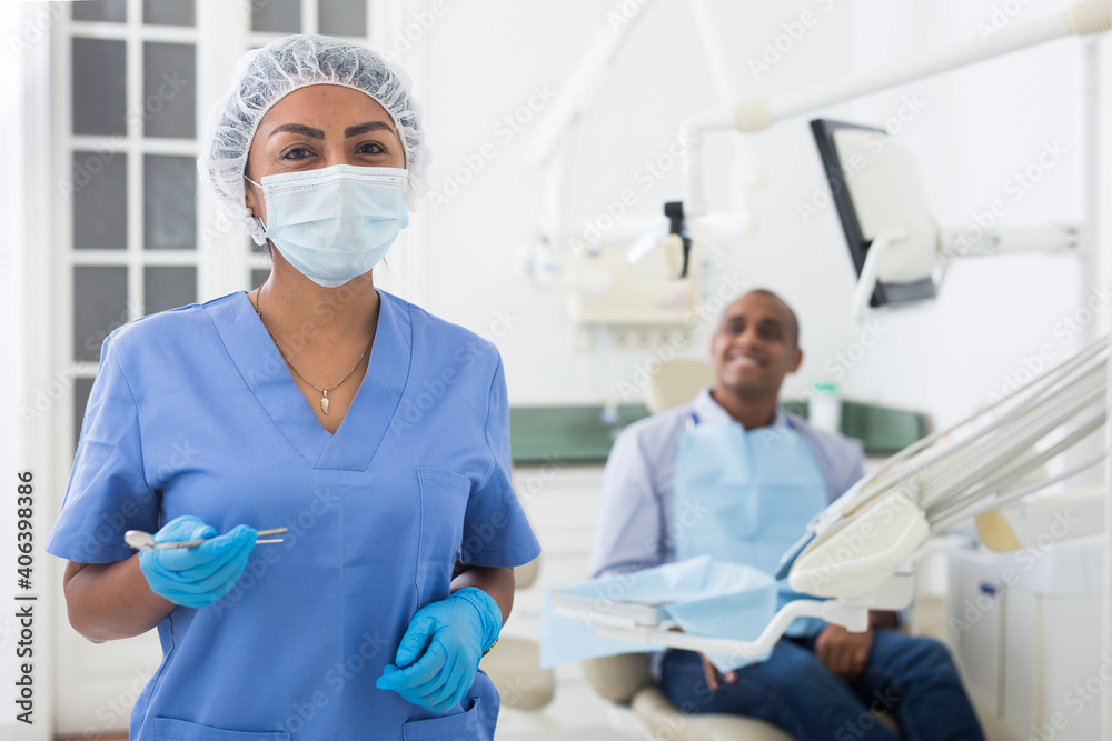 Doctors assistant prepares the dentists workplace for work