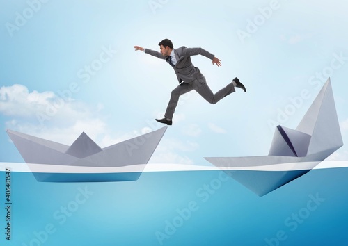 Businessman escaping sunken paper boat ship © Elnur