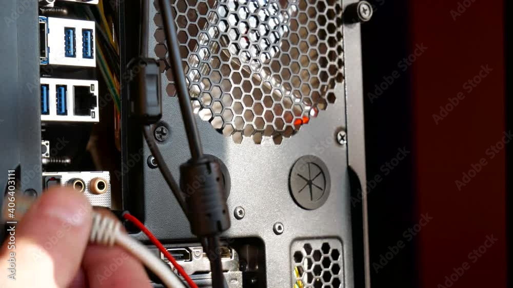 Caucasian man deconnecting then reconnecting the slow poor internet on personal computer, trying to refreshh the connection.
