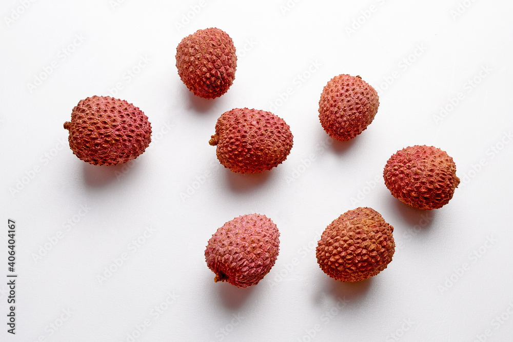 Lychee fruit on a white background close-up Lychee fruit on a white background close-up