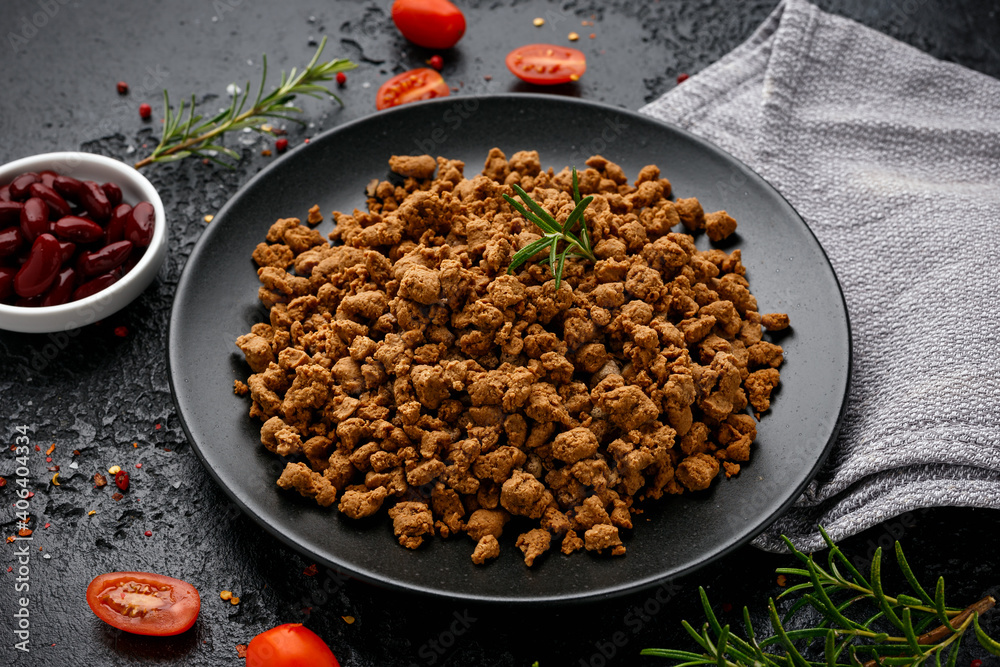 Fototapeta premium Raw vegetarian vegan protein mince as background healthy food concept