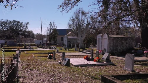 Angel guarding the cemetery grounds in Bay Saint Louis, Mississippi photo