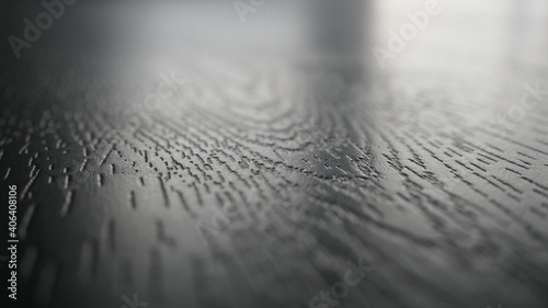 Φωτογραφία closeup of dark grey backdrop structure with centered depth of focus and blurred