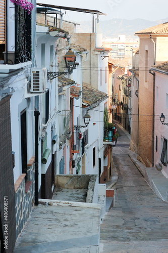 Wallpaper Mural cosy beautiful narrow street in old spanish town Xativa, province of Valencia Torontodigital.ca