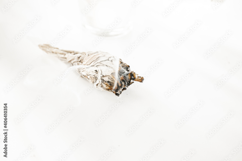 Holistic hygge ritual with sage for energy cleansing and yoga lifestyle Holistic hygge ritual with sage for energy cleansing and yoga lifestyle