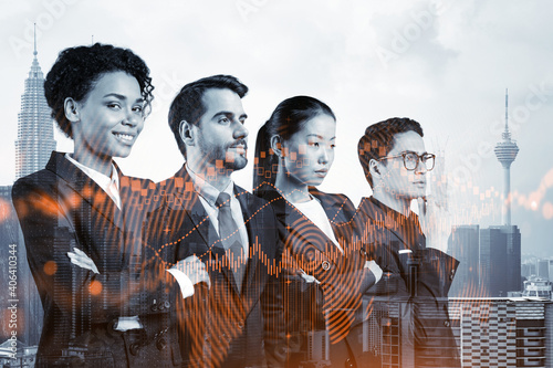 Photography Group of business colleagues in suits as a part of multinational corporate team working on forecasting trading corporate strategy at fund