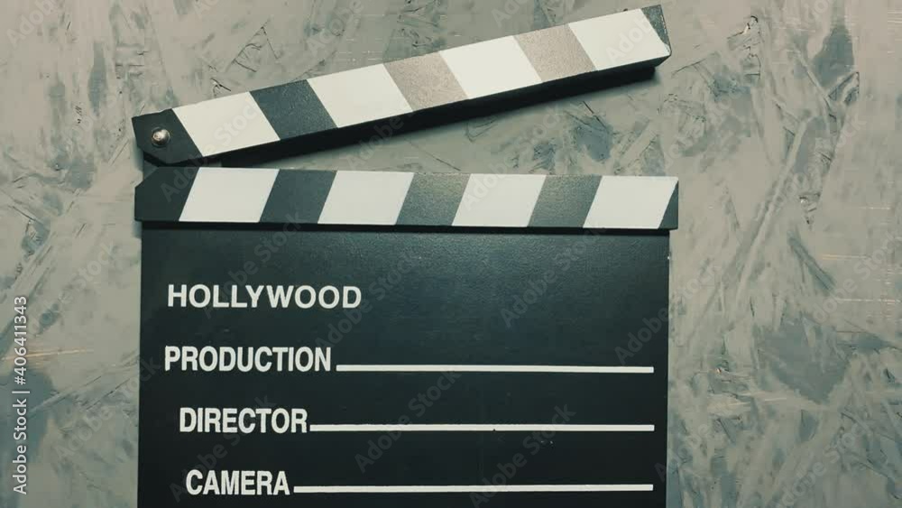 Stop Motion Animation Of Traditional Wooden Clapperboard. - top view