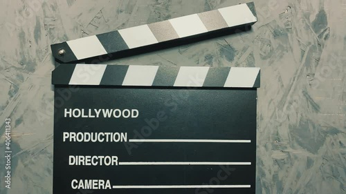 Stop Motion Animation Of Traditional Wooden Clapperboard. - top view